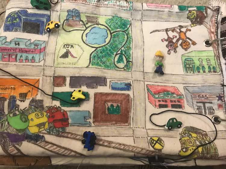After separating the embroidery floss the buttons are all laid out and the page looks great.