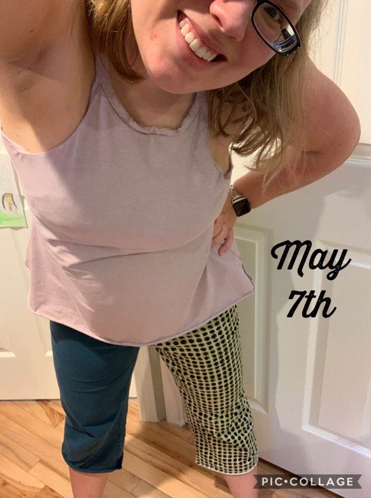 Selfie photo with my head angled to the side to fit in the, mostly, full body photo. I'm wearing a pink top with a stretched out neckline and rolled up hem. The pants hem is also rolling up and both legs are made out of different fabric. Facing you the left pant leg is blue and the right is patterned with stacked black circles on green squares with a white background. Beside me black font says 'May 7th'.
