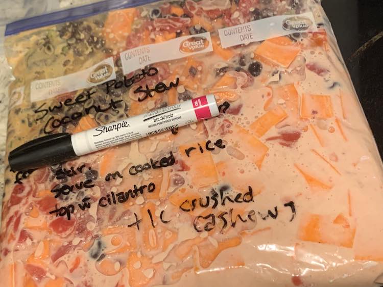 Closeup of the plastic freezer bag holding all of the ingredients for the freeze and slow cook stew.