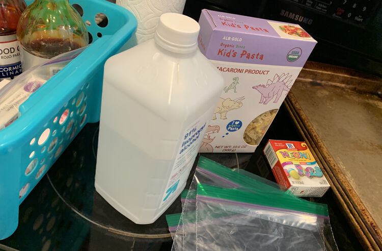 Image shows the supplies needed sitting on the stovetop. The supplies shown are also listed in the caption. 