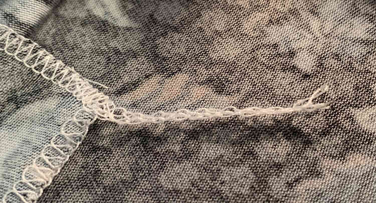 Image shows the same tail as above but this one is shorter with all the threads ending at the same spot. 