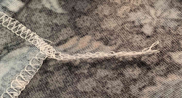 Image shows the same tail as above but this one is shorter with all the threads ending at the same spot.