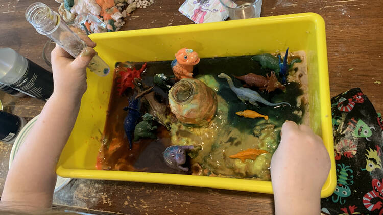Image shows Ada's bin with some of the playdough areas sliming into the vinegar parts.