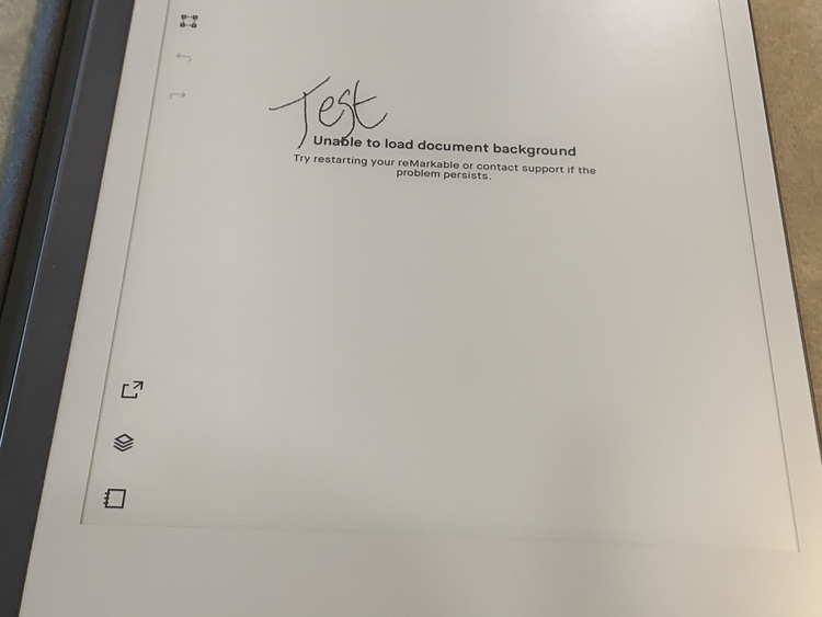 Image shows a notebook page on my reMarkable2 displaying the text "Test" angled over the reMarkable text saying "Unable to load document background / Try restarting your reMarkable or contact support if the problem persists".