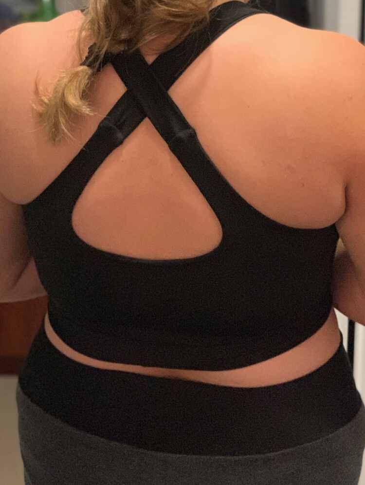 Image shows a closeup of the back of my black Brazi showing the straps crossing and the seam where they are stitched together. 