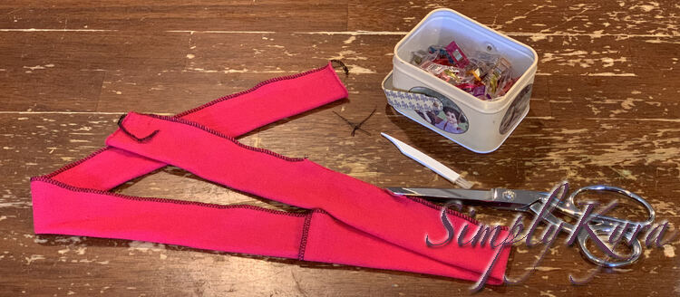Image shows the strip with most of the side sewn closed. There's an opening near one of the ends (center in this image).