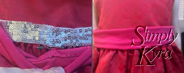 Image is a collage of two images. The one on the left shows the safety pin attaching the dress right under the silver to the bottom of the pink sash. The sash is folded down to better show how it works.