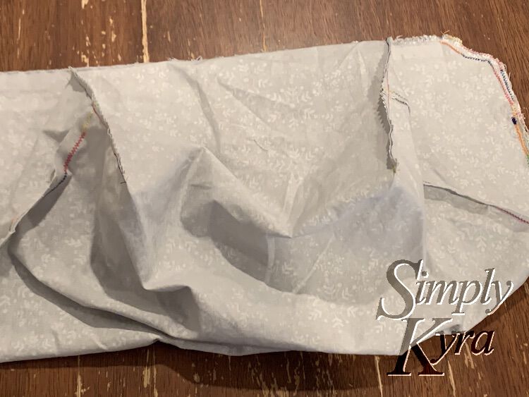 Image shows the same bag with the corners trimmed off with a zigzag pattern.