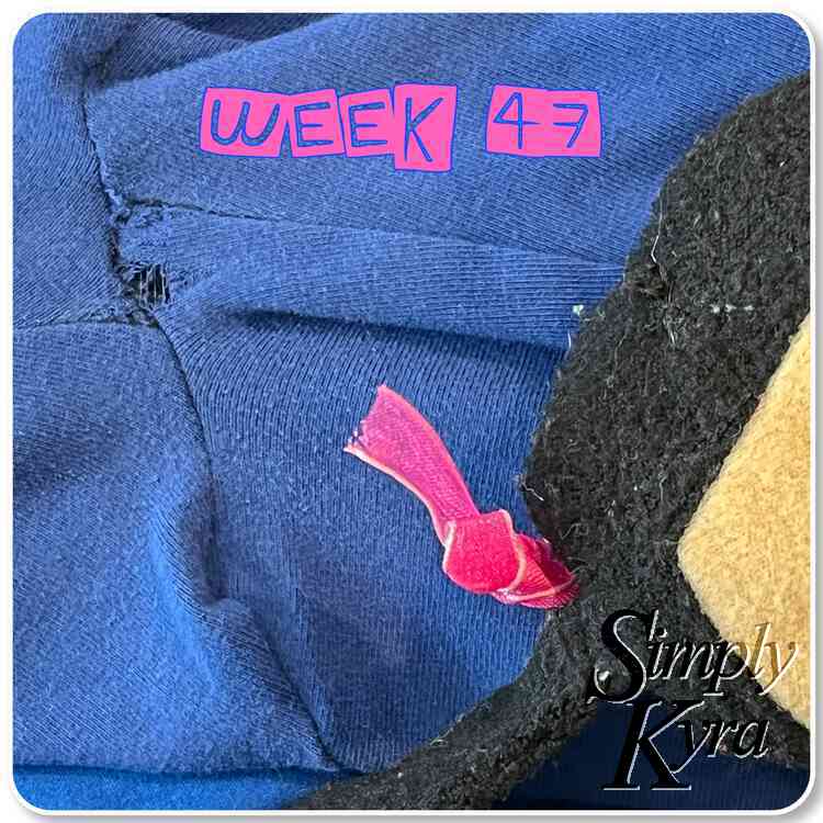 Image shows a ripped center seam in the leggings and the fixed dolly head. Across the top it says "week 47" in pink letters. 