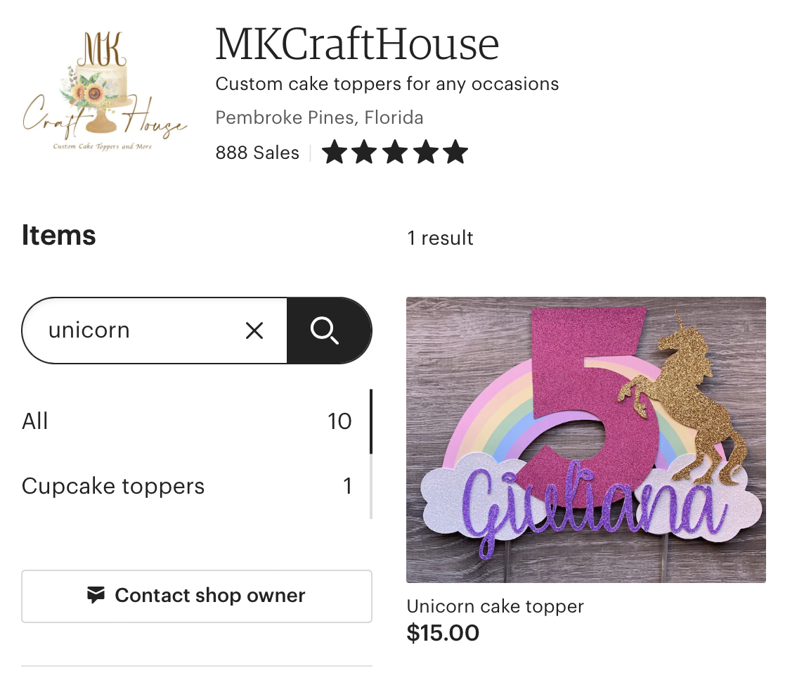 Image shows the storefront of MKCraftHouse with the location, logo, sale numbers, and five star rating. There is currently only one unicorn related topper in stock. 