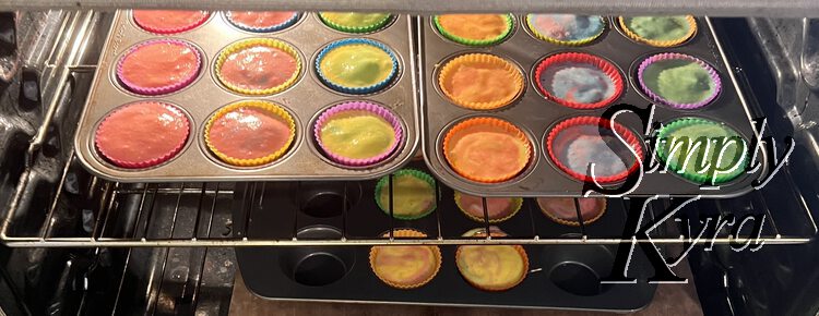 Image shows the first two tins side by side on the top shelf in the oven while that larger tin is sideways below. 