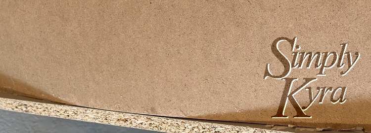 Image shows a close up of the back of the drawer where the flat bottom is bowed enough to each the bottom of the drawer.