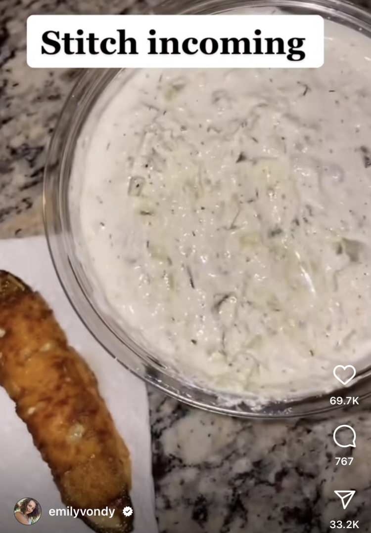 Image is a screenshot of a TikTok video showing a single cheese fried pickle to the left and a container of pickle dip on the right. The top says "Stitch incoming" and emilyvonder's info is along the bottom.