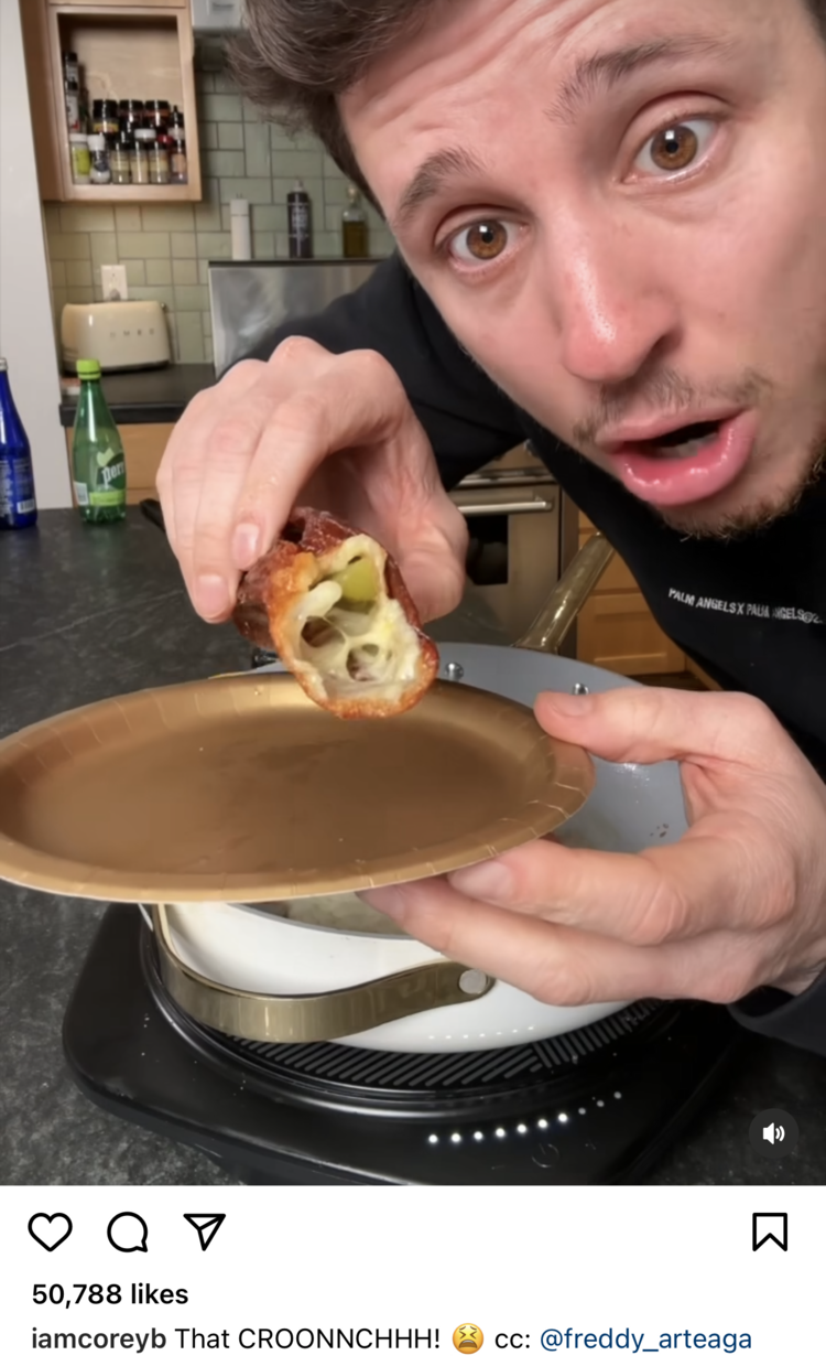 Another Instagram video screenshot this time showing a man's face holding a crispy cheese wrapped pickle concoction over a plate. The caption starts with "That CROONNCHHH!".
